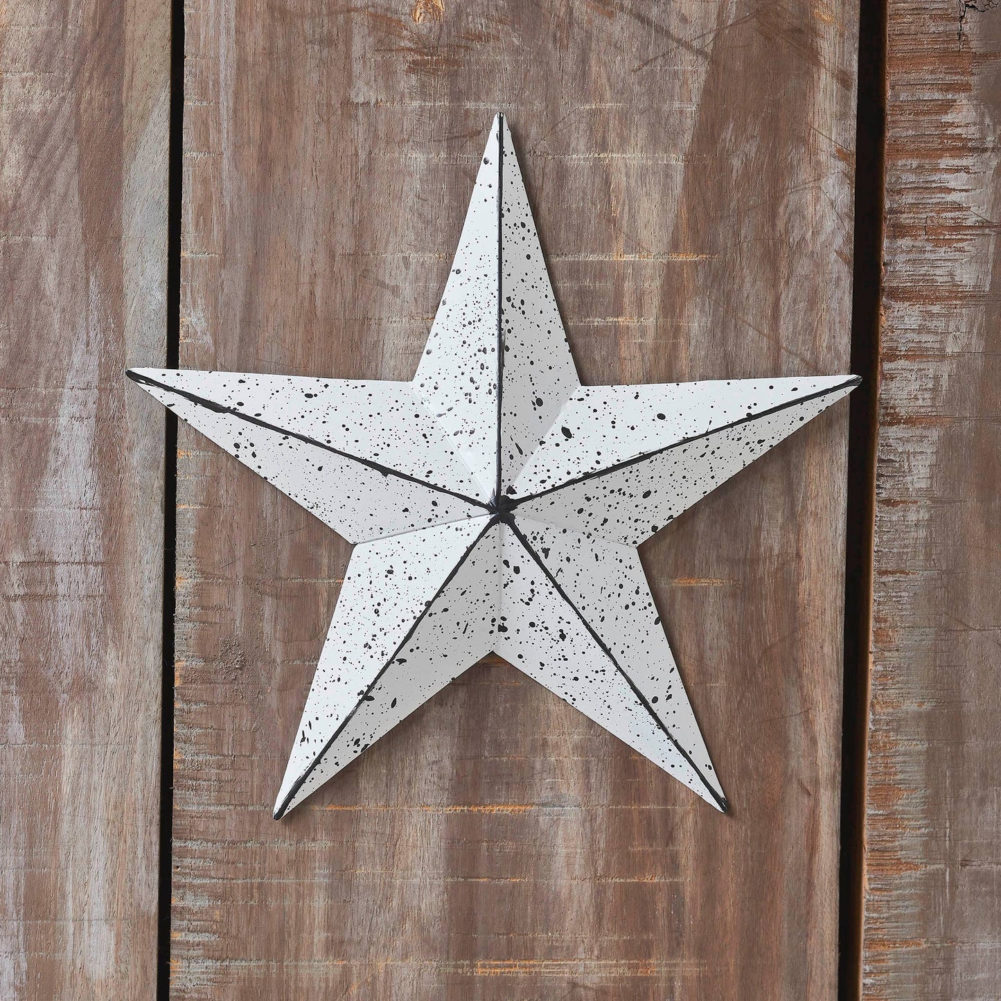 Colgante de pared blanco con estrella de metal facetado (mediano)