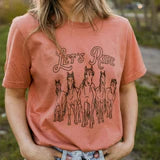 The Montana Scene "Let's Ride" Unisex Printed Tee in Terracotta