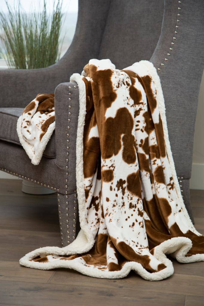 Couverture Sherpa en peluche avec poils de vache sur peau